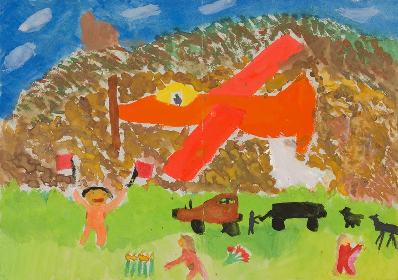 Archiv-Bild „Junge winkt mit Fahnen einem Flugzeug zu“